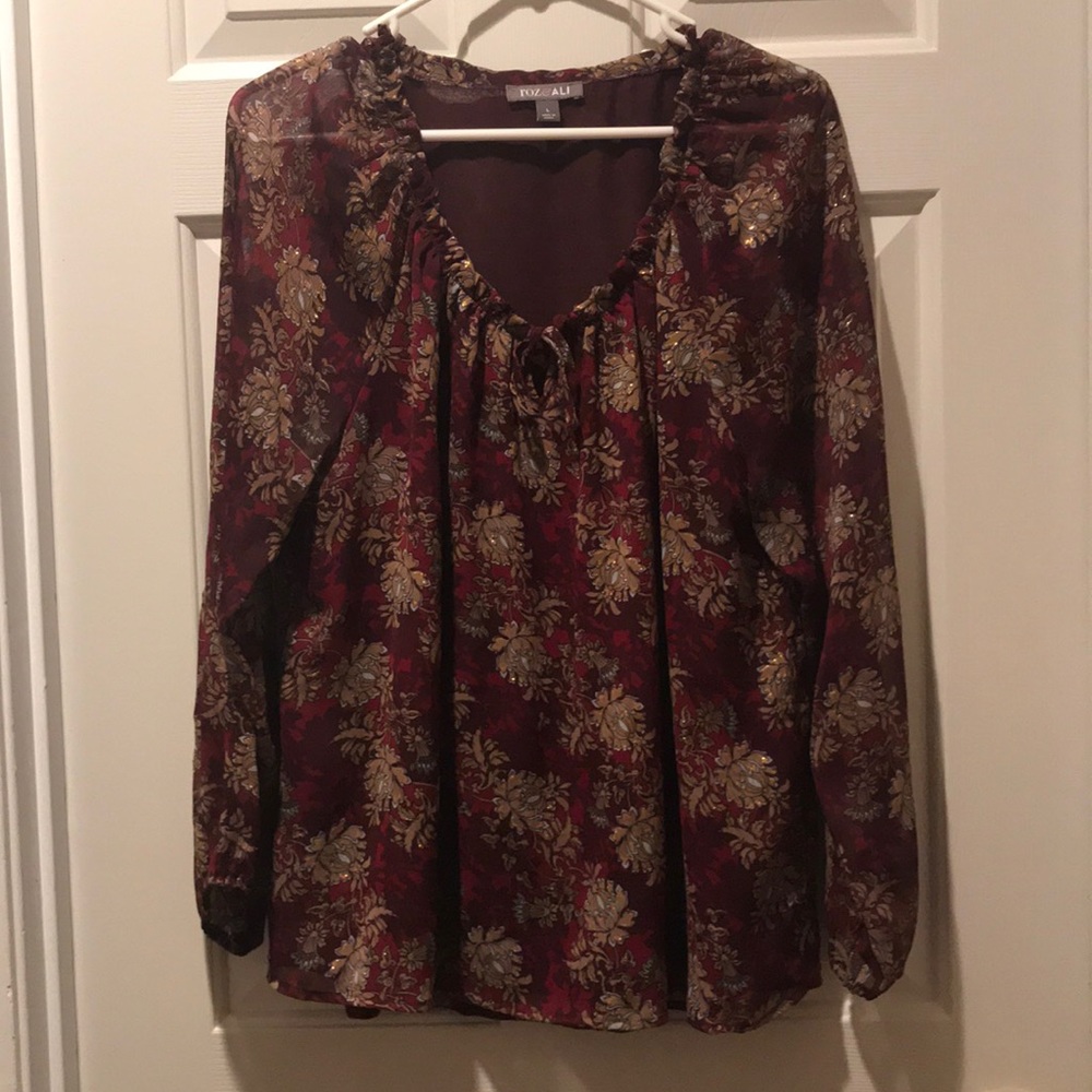 Top...... Beautiful deep maroon color